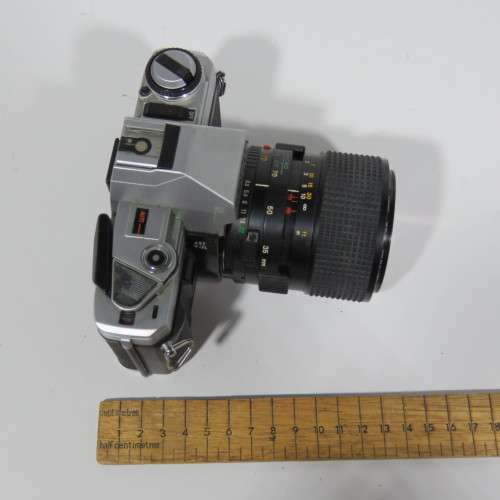 Vintage Minolta X-300 35mm camera with 1:3.5 Minolta 55mm lens