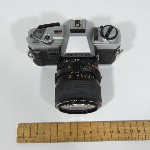 Vintage Minolta X-300 35mm camera with 1:3.5 Minolta 55mm lens