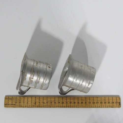 Pair of vintage Aluminium Royal measuring cups