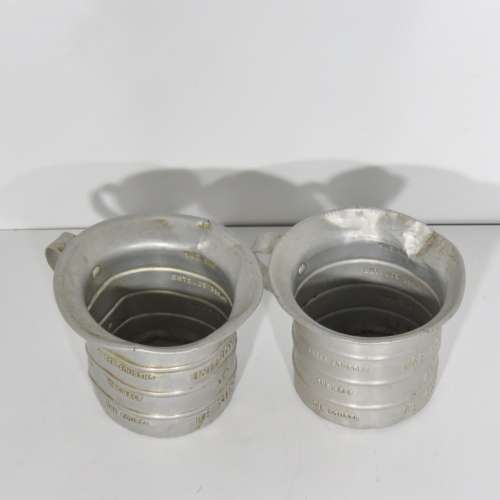 Pair of vintage Aluminium Royal measuring cups