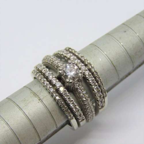 18kt White gold diamond ring with 9kt white gold bands Size H -0.28ct Diamond and 134 small diamonds