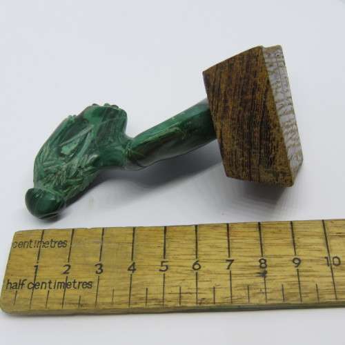 Malachite bust carving on wooden stand