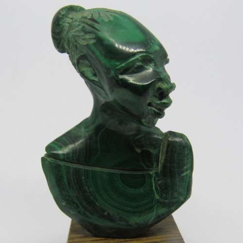 Malachite bust carving on wooden stand