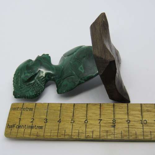 Malachite bust carving on wooden base