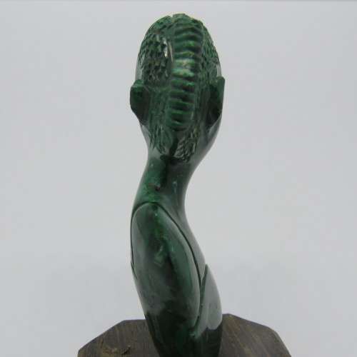 Malachite bust carving on wooden base
