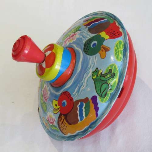 Vintage tinplate and plastic spin top - Made in Western Germany