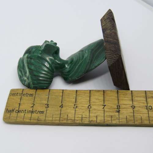 Malachite bust carving on wooden base
