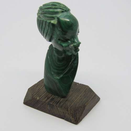Malachite bust carving on wooden base
