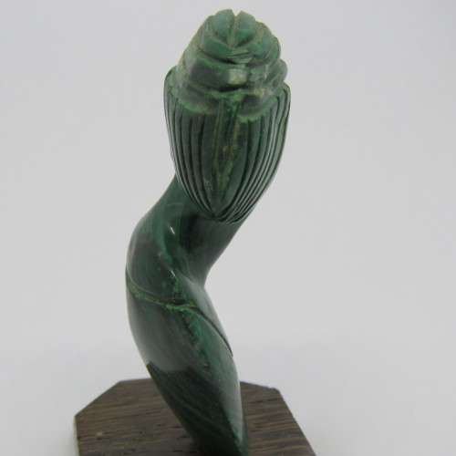 Malachite bust carving on wooden base