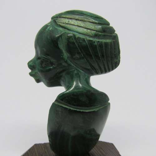 Malachite bust carving on wooden base