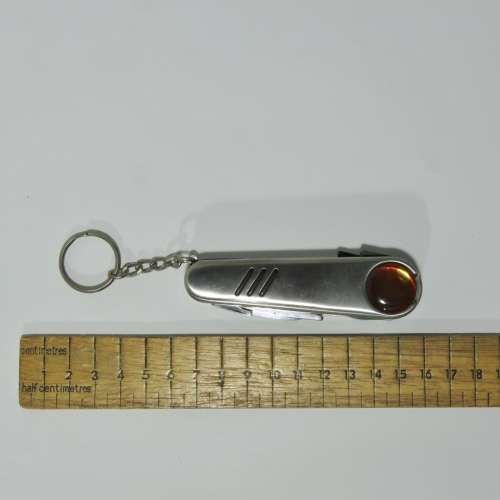 Golfer`s pocket knife tool in gift tin