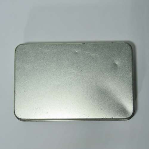 Golfer`s pocket knife tool in gift tin