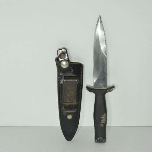 Vintage Gerber boot knife with leather sheath