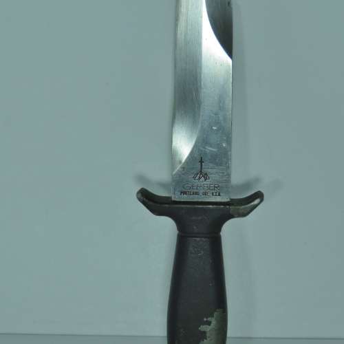 Vintage Gerber boot knife with leather sheath