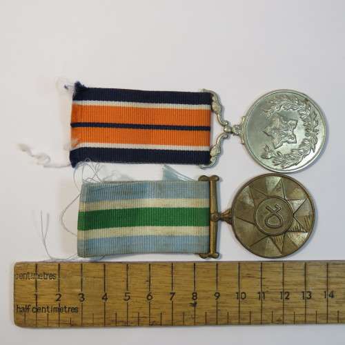 Set of 2 SA medals issued to Japie Prins - General service and unltas medals