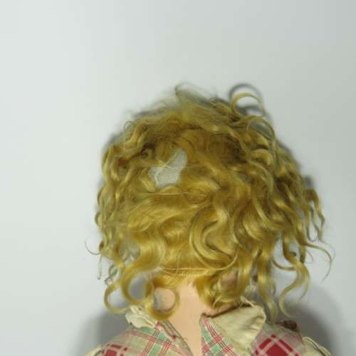 Antique doll with soft body and composition head and limbs - Well used - Length 60 cm