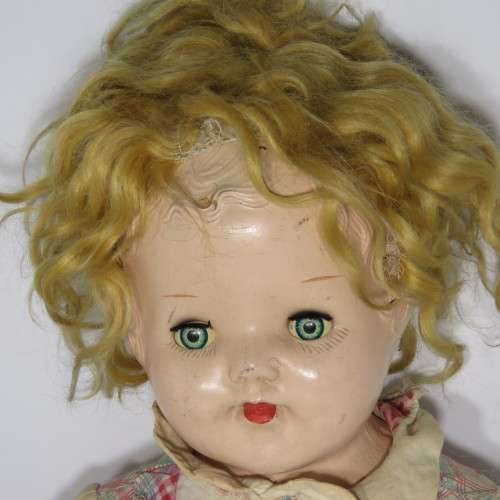 Antique doll with soft body and composition head and limbs - Well used - Length 60 cm