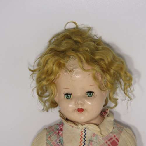 Antique doll with soft body and composition head and limbs - Well used - Length 60 cm