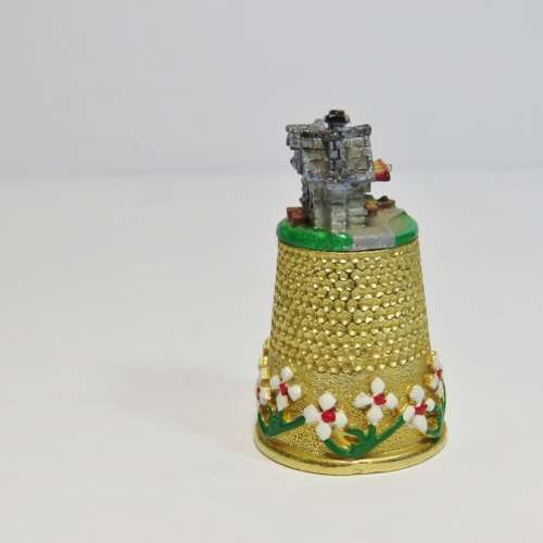 Vintage goldplated thimble village