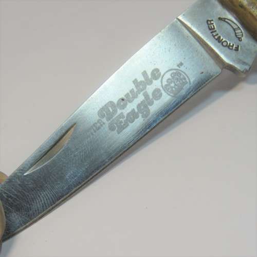 Frontier Double Eagle USA pocket knife with leather pouch - Clip of pouch is broken