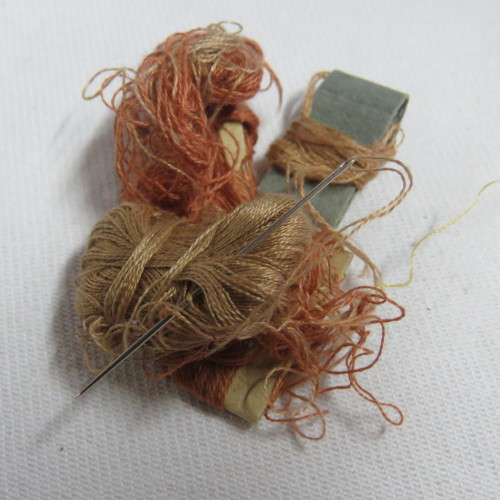 Vintage needlework tin with contents
