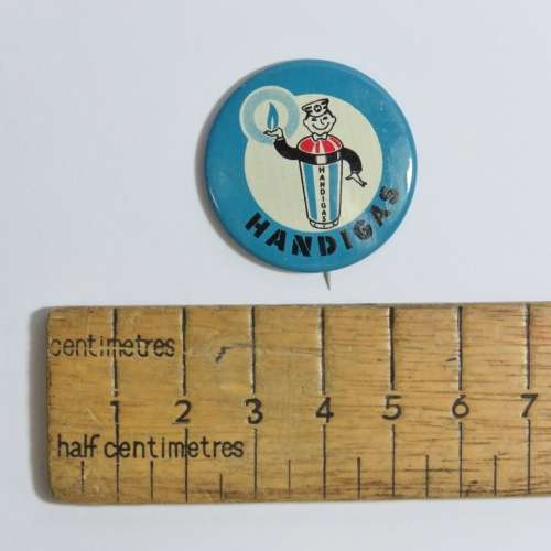 Vintage Handigas Lapel tinnie badge