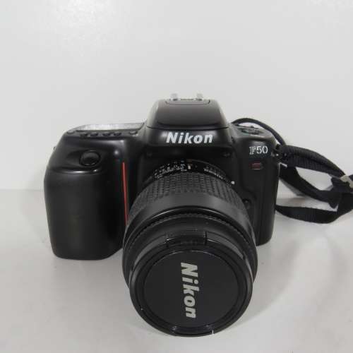 Nikon F50 SLR 35 mm camera with 35-80 mm lens in bag - Not tested - Sold as is