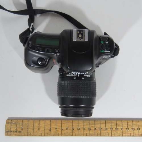 Nikon F50 SLR 35 mm camera with 35-80 mm lens in bag - Not tested - Sold as is
