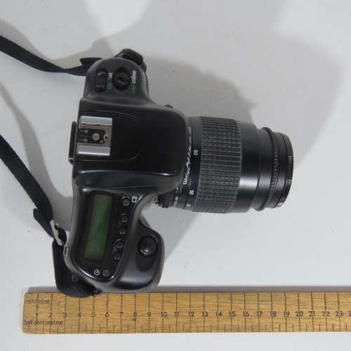 Nikon F50 SLR 35 mm camera with 35-80 mm lens in bag - Not tested - Sold as is