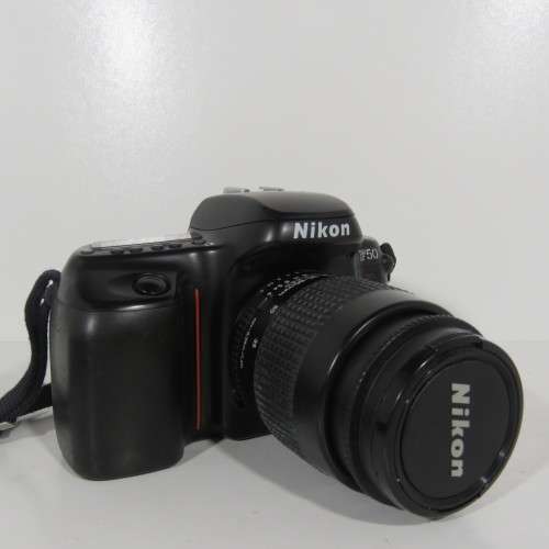 Nikon F50 SLR 35 mm camera with 35-80 mm lens in bag - Not tested - Sold as is