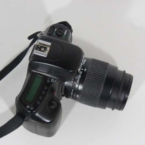 Nikon F50 SLR 35 mm camera with 35-80 mm lens in bag - Not tested - Sold as is