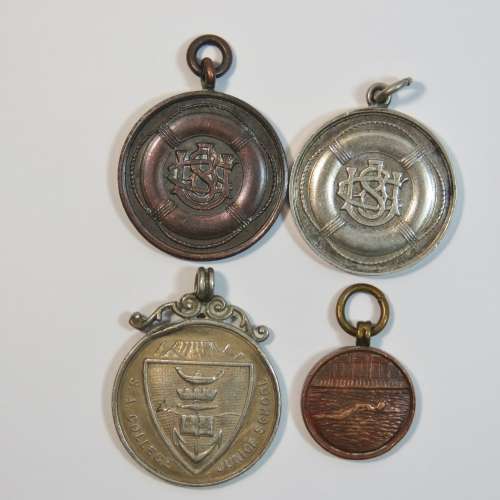 Lot of 4 swimming medals awarded to L.Abrahamson - Two in silver and 2 bronze
