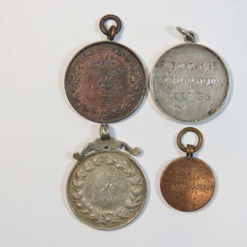 Lot of 4 swimming medals awarded to L.Abrahamson - Two in silver and 2 bronze