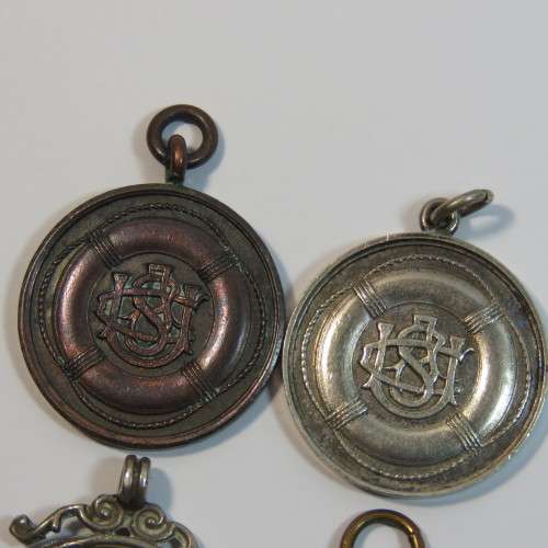 Lot of 4 swimming medals awarded to L.Abrahamson - Two in silver and 2 bronze