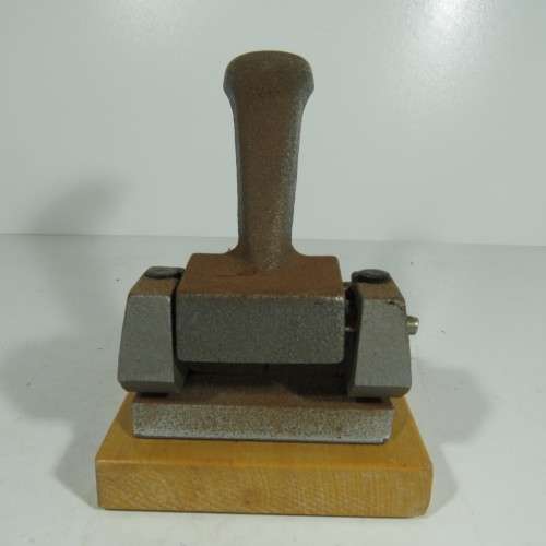 Vintage cast iron paper punch - 2 holes