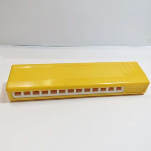 Vintage Avril plastic toy harmonica