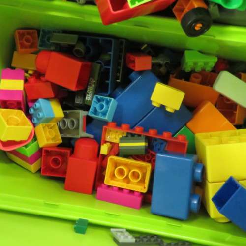 Large lot of assorted building blocks - Lego Duplo, Mega blocks, Playmobil - Plastic bin included