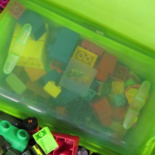 Large lot of assorted building blocks - Lego Duplo, Mega blocks, Playmobil - Plastic bin included
