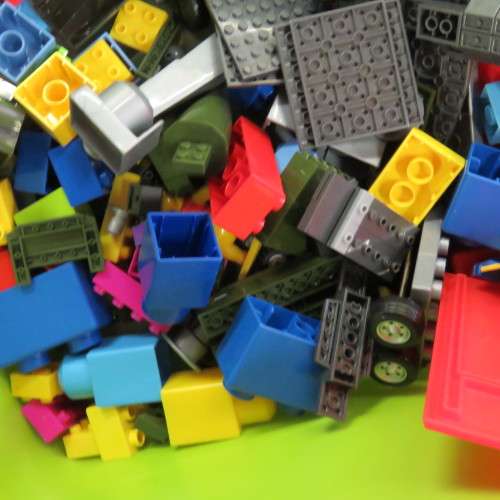 Large lot of assorted building blocks - Lego Duplo, Mega blocks, Playmobil - Plastic bin included