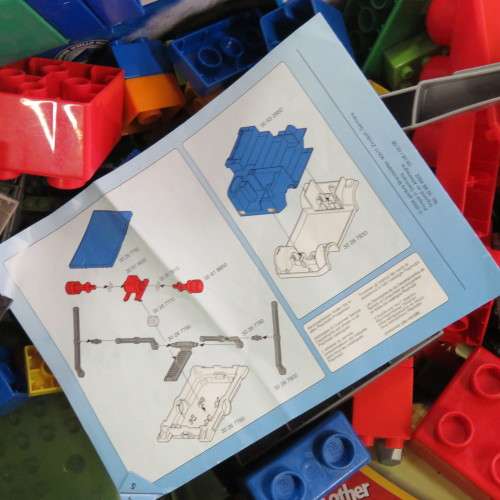 Large lot of assorted building blocks - Lego Duplo, Mega blocks, Playmobil - Plastic bin included
