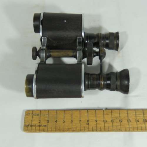 Antique E. Burmester Cape Town binoculars in leather case - One eye piece missing