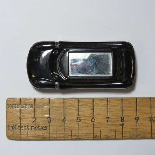 Car shaped electric pocket lighter with mirror - Not working