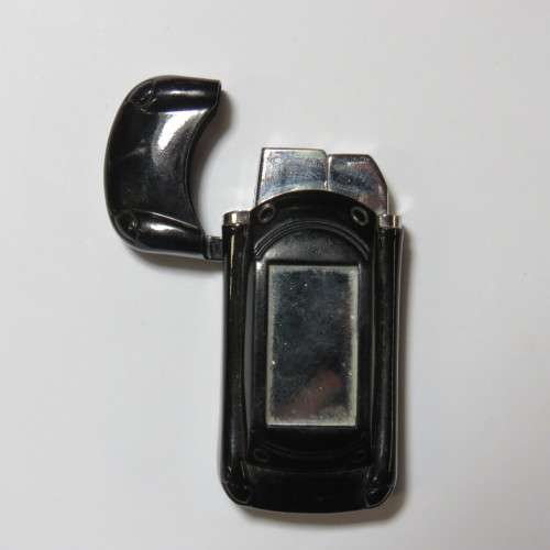 Car shaped electric pocket lighter with mirror - Not working