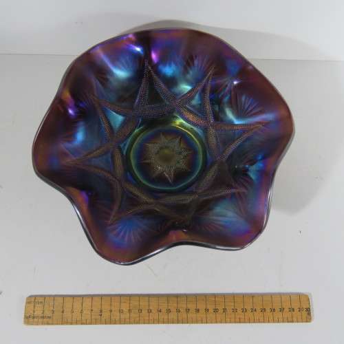 Beautiful purple carnival glass fruit bowl