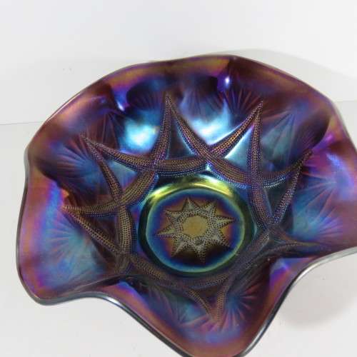 Beautiful purple carnival glass fruit bowl