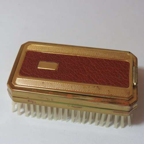 Vintage slide top brush with mirror and combs