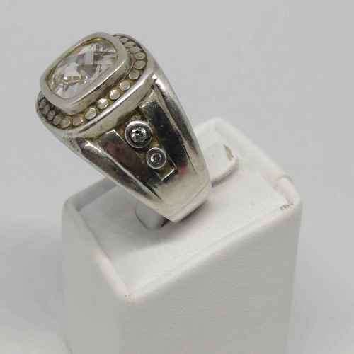 Sterling Silver ring with 5 stones - Central clear stone and 4 diamonds on side size T -weighs 15.4g
