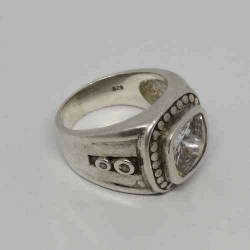 Sterling Silver ring with 5 stones - Central clear stone and 4 diamonds on side size T -weighs 15.4g