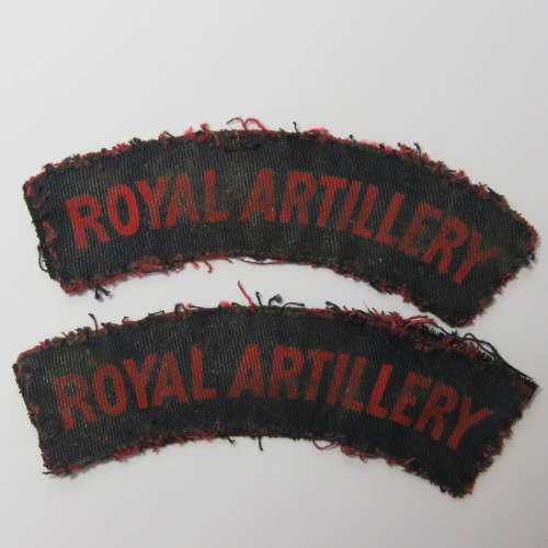 Pair of Royal Artillery cloth shoulder titles