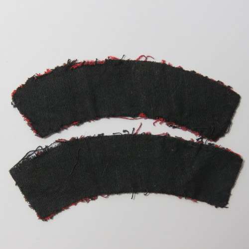 Pair of Royal Artillery cloth shoulder titles